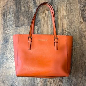 Orange Micheal Kors bag